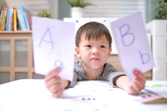 kid learning alphabets